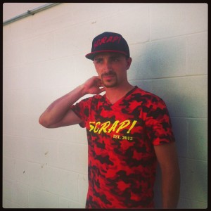 posin in the limited edition hell-oflage camo tee
